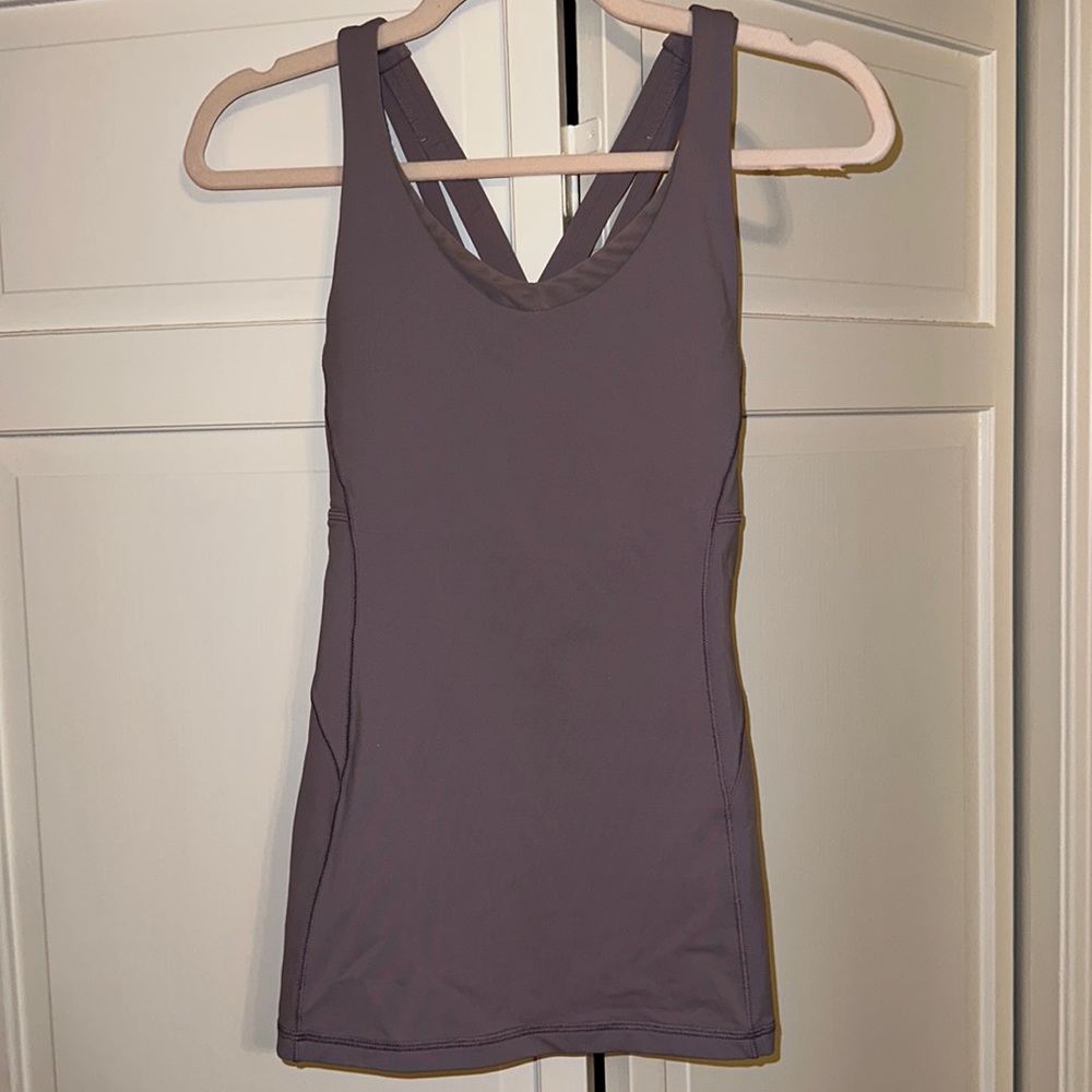 Size 6 light purple tank with built in bra. No pads